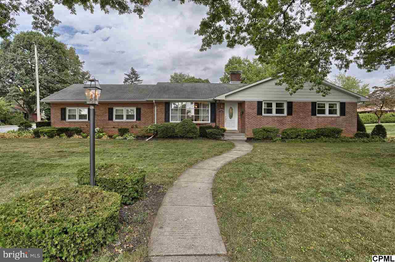 Gorgeous Brick Ranch with Hardwood Floors, Updated Kitchen with Newer Counter Tops, Tile Floor and Pantry. Home Features Bay Window with Lots of Natural Light. Tons of Storage and a Full Basement with a Fireplace. Home is on a Corner Lot with a Tons of Room for Entertainment Including the Large Covered Porch. Home also Features a Two Car Side Entry Garage!!