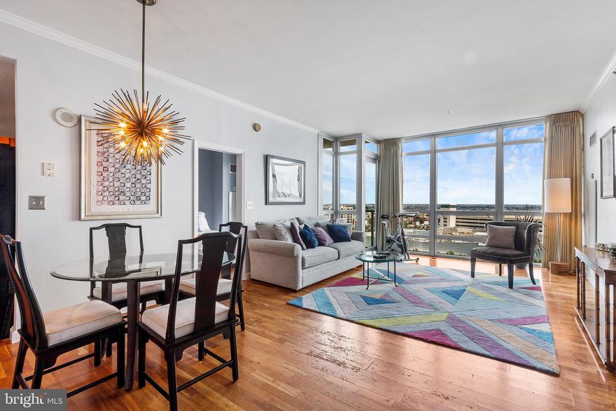 Bathed in morning sunlight, this beautifully upgraded home, with the most sought after floor plan, is a gem! A true two bed/1.5 bath with the perfect kitchen/dining area combo.  The living room is decorated with custom blinds and drapes, crown molding, and a modern new dining room light fixture.  California Closets throughout in addition to a wall unit in the guest bedroom! PARKING INCLUDED. Other spots are available for rent or sale. Higher ceilings than you find on lower floors in the Regatta with a tasteful finish, floor to ceiling living room windows and a terrace!  Waterfront Square is a beautifully maintained oasis with manicured gardens inside a gated community. An abundance of outside areas for relaxing, walking, or just getting out. Center City's largest private gym, pool area, and river deck.  Yoga and Pilates Classes (additional), 24 hr Valet/ Concierge, Assigned Parking OR Valet parking,  two Dog Parks, and a Weekday Daily Shuttle to Center City are all offered at Waterfront Square!