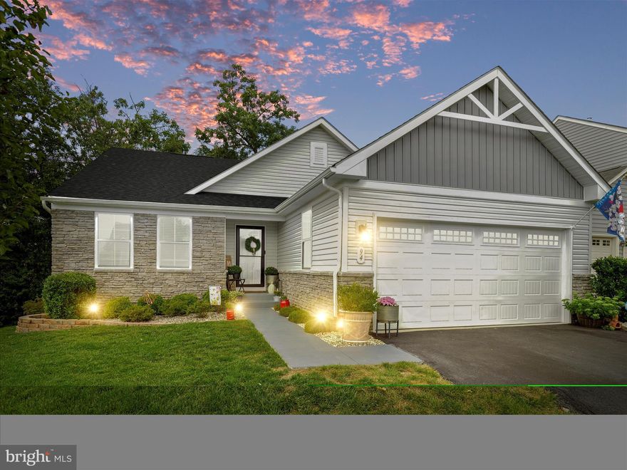 Are you searching for a single-level home with added space for your family's needs, look no further! This stunning rancher in the sought-after The Lakes at Martinsburg subdivision offers everything you need and more.  Built in 2019, it features three bedrooms and two full bathrooms on the main level, providing ample space for comfort and convenience.
Upon entering, you'll be greeted by an open floor plan where the kitchen seamlessly flows into a spacious family room, ideal for gatherings and entertaining. The partially completed basement adds even more potential, boasting a large area perfect for a theater, exercise room, bedroom or game space for the kids plus a full bathroom.  Additionally, there's a storage room and a workshop with a walkout to the backyard patio.
Step out the back door onto a deck that leads down to a beautifully designed patio. The deck overlooks a serene backyard surrounded by trees, offering a perfect setting for family barbecues and outdoor enjoyment.
Located just 12 minutes from downtown Martinsburg, 22 minutes from Hagerstown, MD, and 35 minutes from Winchester, VA, this home is ideally positioned for convenience and tranquility. Don't miss out on this exceptional property—it won't last long!