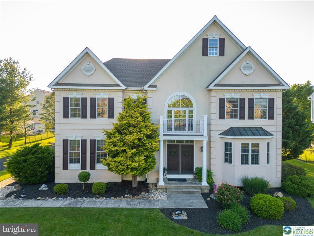 Welcome to this stunning, beautifully maintained 4+ bedroom, 3.5 bath home offering over 5,200 sq ft of well designed living space on a flat prime half-acre lot in Southern Lehigh School District. From the cathedral-vaulted foyer, admire elegant details—tray ceilings, hardwood floors, custom woodwork, & abundant natural light. The expansive eat-in kitchen features large breakfast counter & center island, perfect for daily living and entertaining. An elegant dining room with bay window & spacious formal living room add to the home’s refined charm. A mudroom & laundry area are conveniently located off the oversized 3-car garage. The extra-large master suite offers a luxurious bath & extensive walk-in closet, complemented by three additional spacious bedrooms upstairs. The new & tastefully renovated basement provides excellent flexibility—ideal for a media room, gym & guest suite. A private office with its own driveway entrance & French doors on both sides offers a quiet, professional workspace. The beautifully landscaped backyard is a peaceful retreat with deck off the family room. This lot is perfectly positioned for backyard sunsets. Within walking distance to Southern Lehigh’s middle, intermediate, and HS, just minutes from The Promenade Shops for dining, shopping, & entertainment. Enjoy easy access to parks, trails & scenic Rail Trail. Route 78, & other major highways. blends luxury, location, & lifestyle. 2023 Brand new Roof, 2024 renovated Basement, 2025 brand new HVAC