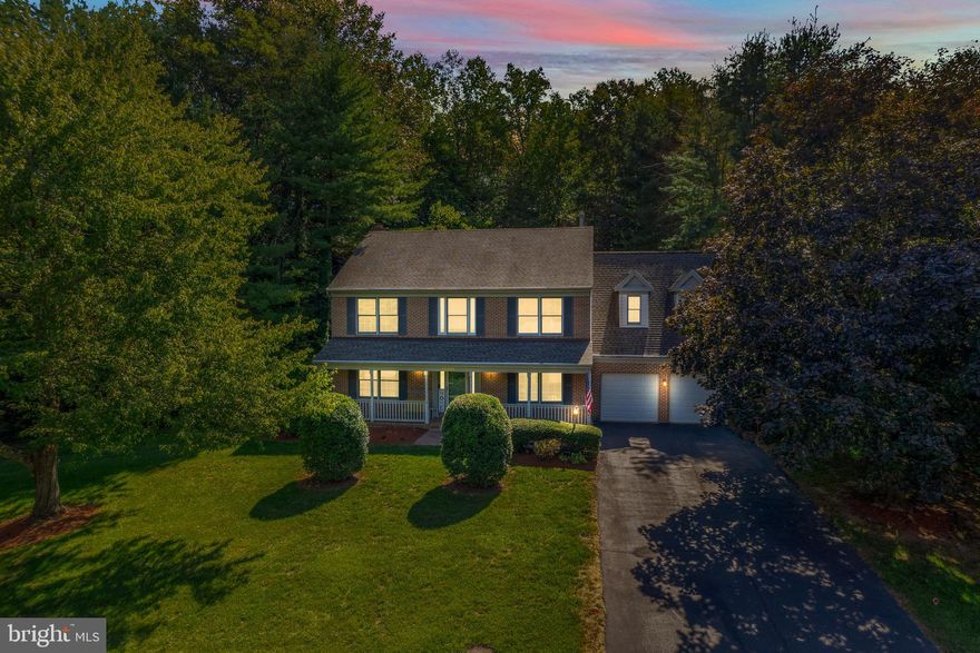 Price Improvement ** VA Assumable Loan 2.25% offers a huge savings** Welcome to this beautiful 4-bedroom, 2.5-bathroom home nestled on a half-acre lot backing to peaceful trees, offering both privacy and natural beauty. The highlight of outdoor living is the expansive screened rear porch with skylights, perfect for enjoying the outdoors year-round, plus a spacious deck for entertaining.

Step inside to a 2-story foyer that leads to a bright and inviting layout. The kitchen features stainless steel appliances, Silestone countertops, and plenty of cabinet space, making meal prep easy and efficient and main level laundry. The adjacent family room, with its cozy fireplace, is the perfect place to unwind.

Upstairs, the primary suite offers a comfortable sitting area and an en-suite bath with a soaking tub and separate shower. Three additional bedrooms are generously sized. The fully finished lower level provides extra living space with a rec room, den, and a home theatre for movie nights at home.

The backyard oasis completes this dream home, offering endless possibilities for relaxation and outdoor enjoyment. A 2-car garage adds convenience, while the quiet, wooded setting ensures tranquility. This home is the perfect blend of comfort and charm—don’t miss out!