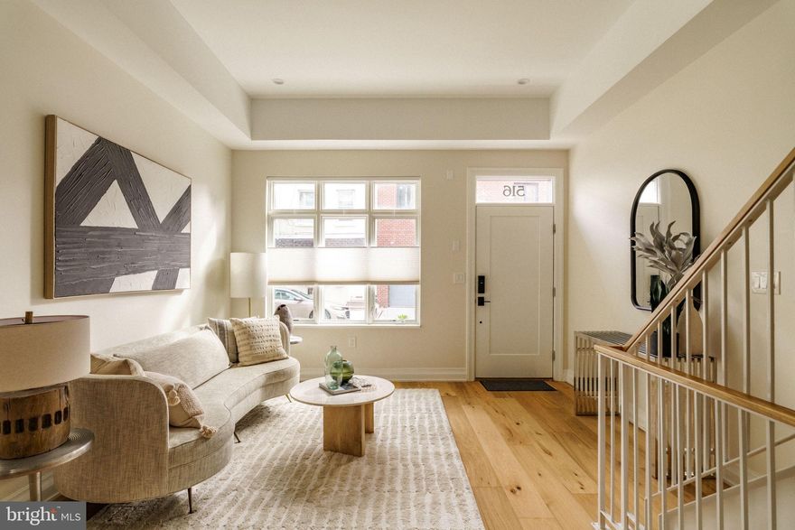 4.75% Fixed Interest Rate for 5 Years / 4.875% Fixed Rate for 7 Years Available with Preferred Lender — Limited-Time Rate Buydown Offer for Qualified Borrowers.

A rare opportunity to own ground-up new construction in the heart of Fitler Square, within the highly coveted Albert M. Greenfield School catchment. Designed by LTD Design, this 4-bedroom, 4.5-bath luxury residence offers approximately 2,600 square feet of impeccably crafted living space, combining modern design with timeless sophistication.

The main level features an open, light-filled floor plan with wide-plank white oak flooring and an elegant living area that flows seamlessly into the dining space and chef’s kitchen. Designed for both style and function, the kitchen showcases custom two-tone cabinetry, veined quartz countertops and backsplash, Thermador appliances, and an oversized island with waterfall edges. A set of glass doors opens directly to the private backyard, creating a natural extension of the living space—ideal for outdoor dining and entertaining.

The second floor offers two spacious bedrooms, a full bath, and a conveniently located laundry room. The third floor is dedicated to the primary suite—a tranquil retreat featuring a grand custom walk-through closet and a spa-like bath with dual vanities, heated floors, a freestanding soaking tub, a frameless glass shower with rain head and body sprays, and a Neorest bidet toilet.

The fourth level encompasses a full-floor flex space with a full bath and wet bar, providing versatility for a home office, guest suite, or den, with access to a stone-paver roof deck offering sweeping skyline views.

Additional highlights include dual-zone HVAC, a 1-year builder’s warranty, and a 10-year tax abatement for long-term savings. Located steps from Fitler Square Park, the Schuylkill River Trail, and some of the city’s best restaurants and cafes, this home perfectly blends modern luxury with urban convenience in one of Philadelphia’s most sought-after neighborhoods.  Note: Current tax estimate does not reflect abatement savings — estimated 2025 annual taxes are approximately $4,200.