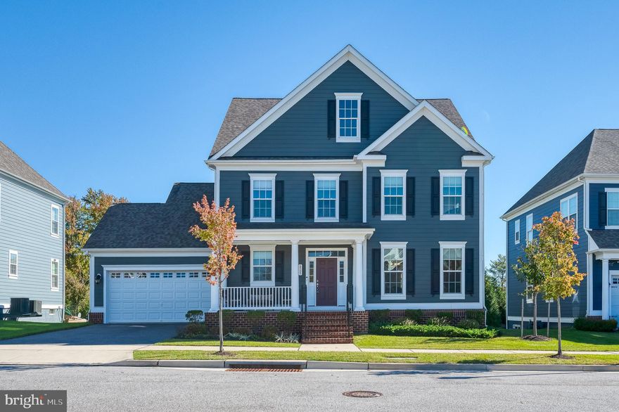 THIS HOME BRAND NEW WOULD COST $850K+! Take advantage of a instant equity by purchasing this barely lived in home!  This stunning Mount Vernon Villa model by Williamsburg Homes (built 2022) is located in the sought-after Greenleigh at Crossroads Community. This rare model offers more than 5500 sq. ft. of elegant living space set against peaceful greenery—with no future construction behind. Inside, enjoy 9-foot ceilings, luxury vinyl plank flooring, and an open-concept layout ideal for modern living. The gourmet kitchen is sure to impress with quartz countertops, stainless steel appliances, a spacious pantry, and an oversized island that seats six—perfect for casual meals or entertaining. The main level flows into inviting living, dining, and family rooms centered around a cozy gas fireplace, plus a mudroom/drop zone with garage access and a powder room. A deck off the kitchen can easily be added for outdoor enjoyment. Upstairs, the primary suite is a true retreat with two walk-in closets and a spa-inspired ensuite featuring a dual vanity, water closet, soaking tub, and walk-in shower. Three additional bedrooms include one with a private bath—great for guests—plus a laundry room, another full bathroom and dual-zone HVAC for comfort and efficiency. The finished lower level  adds flexibility with a large open area, half bath, and potential for a fifth bedroom. Ample storage keeps everything organized. Greenleigh at Crossroads offers resort-style amenities—clubhouse, fitness center, yoga studio, outdoor pool, dog park, playgrounds, walking trails, and on-site shops and dining—just minutes from I-95, White Marsh Mall, and downtown Baltimore.
