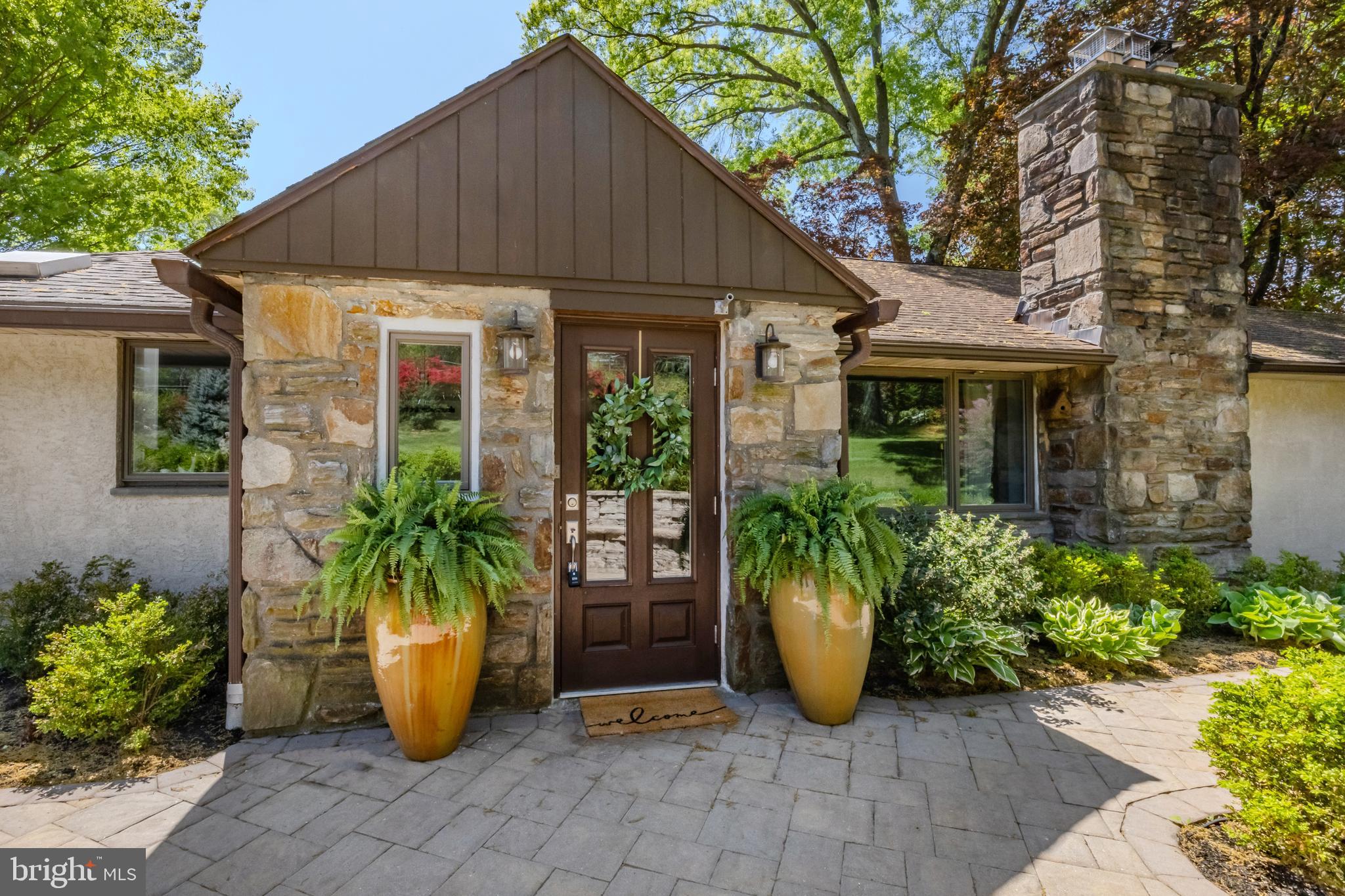 Set on one of the most gorgeous properties, offering over an acre in Allgates, with a completely private backyard oasis and a stellar floor plan is 3542 Darby Rd. This incredibly versatile with over 3,000 square foot home offers one level living if desired and has been beautifully and thoughtfully renovated by its owners. This home is all about letting the outdoors in, the appreciation of the property and the lifestyle it offers you, with its backyard access to coveted township walking trails, a gorgeous pool and serene landscape. You’ll feel like you’re somewhere else! Pull into the very large driveway with tons of space to turn around. The main level of the home starts with a beautiful front entryway, leading into a functional mudroom. The main level of the home is sprawling and naturally sunlit. The kitchen and dining room space are stunning. Upgraded cabinetry, marble countertops, top of the line appliances to include a double wall oven, large windows, custom center island with seating, a modern tiled floor with a European flare and room for a large dining table and server. The living room has 2 large bay windows, Mahogany flooring, a fireplace and space for large furniture. The primary suite is off the charts incredible. It has multiple slider doors that lead out to a wrap-around balcony, a stunning full bath with soaking tub, seamless shower, double floating vanities with storage tower and gorgeous tile work. The bedroom has a fireplace, a tray ceiling and a large walk-in closet. The main level has 2 other large bedrooms and an incredibly modern and upgraded hall bathroom. The lower level which is still above grade is so special, depending on your needs. There is an en suite bedroom with full bath, an incredible laundry room (like no other you’ve seen) with quartz countertops, walls of built-ins for storage and easy access to the 3 car attached garage! The large living room space with custom bookshelves and a 3rd fireplace is perfect for whatever your needs may be. The double slider door allows for so much light to flow in. The open space is great for workouts, kids play and an at-home office. Having a 3 car attached garage is rare at this price point, so take advantage of it! The property out back offers so much privacy whether you are enjoying the pool, entertaining on the lower level patio or sunbathing, nature surrounds you. The current owners of this home have spared no expense making it what it is today. All the materials used throughout the renovations are top of the line, the quality of craftsmanship is bar none and the clean lines throughout the home offer tranquility. The large windows and doors throughout the home work with the element of nature perfectly. This custom built home is truly one of a kind and so versatile for whatever your needs may be and you’ll be proud to call it home.