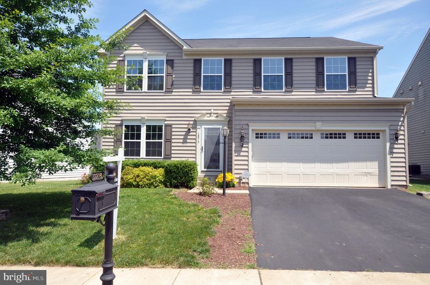 MOTIVATED SELLERS-BRING ALL OFFERS!! MOVE-IN READY! Sought after Three Flags neighborhood with the Spacious "Rome Model" with a finished square footage of a generous 3080 sq ft and below grade unfinished 1480 sq. ft.  This "Rome" model is a 4 bedroom, 3 and a half bath home with a Loft on the upper level for use as an additional family room or study area for the family.  This model has an add on "Morning Room" to  the Gourmet Kitchen.  The Kitchen has Upgraded granite counters, black appliances, NEW REFRIGERATOR! Huge sit- up Island easily seating 6 or more people.  The family room off of the kitchen has a gas fireplace and leads to a separate Den/office/sewing room or playroom.  Their are 6 ceiling fams in the home, recessed lighting in the kitchen, custom light fixtures.  There is a rough-in bath in the lower level and the lower level has a walk up rear entrance.  The 2 car garage has ample space for 2 cars and additional lawn and garden supplies.  The Living Room, Dining Room and Main level Hallway has Hardwood Flooring. The Kitchen has custom tile flooring for easy maintenance.   The home is located conveniently to all major comuter routes.  This home is priced to sell with it's generous size and upgrades.  Low HOA with community pool.SELLER WILL CREDIT $ 5,000.00 TOWARD BUYERS CLOSING COST.