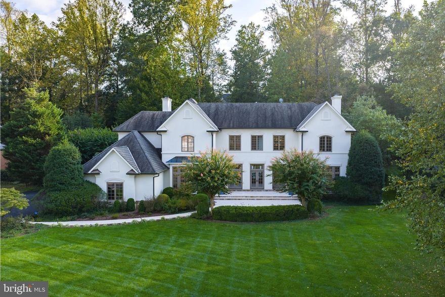 **Offer Deadline: Tuesday 9/30 by 5PM ** Welcome home to Glenhaven, a stunning residence nestled on a secluded cul-de-sac in The Reserve, one of McLean’s most desirable neighborhoods. Experience timeless elegance in this French country–style home, where classic charm meets modern comfort. A series of French doors grace both the front and back of the property, creating a seamless indoor-outdoor flow and filling the home with natural light.

With nearly 8,000 finished square feet, this home is perfect for entertaining. The open design, enhanced by oversized windows and doors allows gatherings to move effortlessly from inside to the expansive outdoor spaces. Whether hosting guests around the pool and outdoor kitchen, or enjoying a quiet evening with the doors open to invite in fresh air, this home is designed for comfort, connection, and style.

On the main level, the grand two-story foyer is flanked by the dining room and formal sitting room, while a private office is tucked away at the front of the house next to the first of two powder rooms on the main floor. The beautifully updated kitchen overlooks the family room, creating a bright and welcoming hub for daily living. The nearby mudroom includes custom cabinetry with great storage, and is adjacent to the side loading three-car garage and second powder room.

Upstairs, the oversized primary suite offers a luxurious retreat with a renovated bathroom, dual walk-in closets, and a serene atmosphere. The laundry room is also conveniently located outside the primary near the second back staircase. Three additional ensuite bedrooms complete the upper level, each offering comfort and privacy. 

The fully finished lower level features brand-new flooring and multiple spaces for entertaining. A stylish wet bar anchors the recreation area, while a flexible room can easily serve as a home gym or media room. A private bedroom with an adjacent full bath makes this level ideal for guests or extended stays.

Outdoors, a gracious veranda with striking arches overlooks the pool and wonderfully landscaped backyard. Thoughtfully designed for both relaxation and entertaining, the backyard is a true extension of the living space.

Situated close to top-rated schools, parks, and shopping centers, this home offers unparalleled convenience while providing a private sanctuary the moment you return.