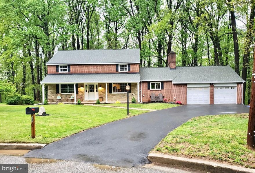 Here is your chance to live in the sought-after Perry Hall Manor Neighborhood with the Gunpowder State Park in its very own backyard! This charming colonial style brick home sits on just over 0.6 acres and boasts 5 bedrooms, 2.5 Baths and is completely redone with no expense or attention to detail spared. New paint, trim, windows, flooring, appliances, kitchen, baths, fixtures, garage doors, driveway, HVAC and the list goes on! Within the last 5 years a new well, septic and roof were also fitted. This home comes equipped with 2 family rooms, one of which utilizes its oversized windows for a beautiful view of the Gunpowder State Park that can be enjoyed year-round. The second is equipped with a stone fireplace and pellet insert that's perfect for those winter nights. The 5th bedroom, a full bath and partial kitchen are located above the attached 2 car garage and can be accessed through the garage, the second family room or a rear private entrance making it the perfect in-law suite, private office space, or room for rent. The basement is partially finished and the back yard is a blank slate. Both are ready for you to apply your own personal touch. Amenities include- fantastic local restaurants, public parks and playgrounds, minutes from major highway access, all from a very quiet neighborhood with no through traffic. You will even have immediate access to the Gunpowder hiking trails from inside of the neighborhood. You won’t want to miss this!