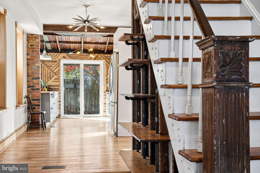 Charming 3-bedroom, 1.5-bath home in a highly sought-after location! Thoughtfully cared for and creatively updated, this home blends character, style, and modern comforts. You're instantly greeted by a stylish façade with a custom-painted front door and transom above. Natural light fills the space, highlighting the home’s warmth and innovative design details. The living room is spacious and inviting, boasting parquet floors, exposed brick, and shiplap, with an arched doorway showcasing an ornate wood-carved banister and industrial bookshelves just under the stairs. A quaint powder room is conveniently located, with a vintage vanity, transoms, a frosted window and shelves for plants.

The kitchen is a true standout with vaulted ceilings, exposed brick, unique lighting and wooden details, featuring top-of-the-line appliances, subway tile, butcher block countertop and plenty of cabinets.  There's space for a dining table and an open layout that’s both functional and striking. Step outside to an enclosed backyard with a mature tree, brick pavers, and a wooden privacy fence, perfect for morning coffee, quiet evenings or entertaining.

Upstairs, you'll find three bright and airy bedrooms with hardwood floors and artful details. The second level is complemented by a hall linen closet and a stylish hall bathroom with classic penny tile, a stall shower, wooden details, and a window for natural light. The basement provides laundry and storage space, while central air and a Nest thermostat make city living easy and comfortable.

Ample parking and a convenient location within steps of the best dining, shopping, and nightlife. A short walk to Post Haste, OG Pizza, Fiore’s Shakes & Steaks, Zig Zag BBQ, and Atlantis: The Lost Bar.and too many others to mention.  With nightlife, several local cafés and boutique shops, just around the corner.  The location offers the perfect balance of convenience and culture, with a lively, energetic feel.  With Pop’s Skatepark on the corner, Penn Treaty Park within walking distance, and nearby galleries, the neighborhood is full of life and inspiration. Public transit is close by, with the SEPTA Market‑Frankford Line at Huntingdon and York–Dauphin stations, plus multiple bus routes within walking distance. Just minutes to Center City and near I‑95, offering a quick drive to the airport, stadiums, and local bridges for an easy commute to New Jersey, New York, and Delaware.