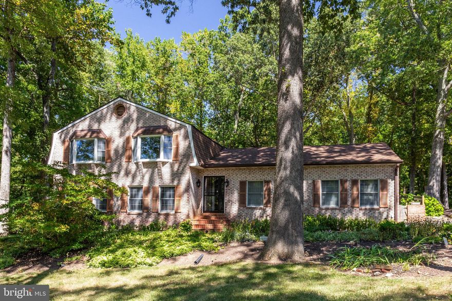 Nestled within the charming community of Pomfret, this exquisite split-level all brick home stands proudly on a serene 1.6-acre private lot. Timeless elegance and meticulous landscaping define this property, making it a true gem in its quaint setting. As you approach, the lush greenery in every direction and the enticing heated inground pool within a fenced area greet you warmly, inviting you to enjoy outdoor living at its finest. Just around the corner, a picturesque walking and bike path awaits, promising leisurely strolls and active adventures.

Stepping inside the home's enclosed vestibule, you immediately sense the welcoming ambiance that pervades throughout. The main level of this residence is a showcase of spaciousness and natural light, creating a bright and airy atmosphere that uplifts the spirit. Solid wood pocket doors gracefully separate the formal dining area from the well-appointed kitchen and the inviting sitting room, allowing for versatility and intimacy as desired. On the far end of this level, you'll discover three generously sized rooms, accompanied by two full bathrooms.

Descending a few steps to the lower level, you'll find a recently painted gathering room that doubles as an entertainment hub, featuring a cozy wood-burning fireplace and built-in shelving that adds character and functionality to the space. The highlight of this level is the expansive primary suite, which pampers you with two walk-in closets and an ensuite bathroom filled with an abundance of natural light. This bathroom is your personal oasis, complete with a generously sized jetted tub for relaxation, and a separate shower.

​Wood flooring has been updated, the upper level has been recently painted and the primary bath was renovated in 2018.  The entire home has been extemely well maintained over the years.   The roof was replaced in 2017. 

The oversized garage is a handyman's dream, equipped with a workbench and storage shelves, offering both utility and convenience. Additionally, a thoughtful half bathroom has been strategically designed for easy access from the pool area and the garage, a delightful discovery that adds a layer of practicality to your daily life.

This remarkable property boasts four bedrooms and three and a half bathrooms, making it the perfect family home where elegance and comfort harmoniously blend. With its lush surroundings, luxurious amenities, and thoughtful touches, this home in Pomfret is a true sanctuary that promises an unparalleled living experience within a delightful, close-knit community.