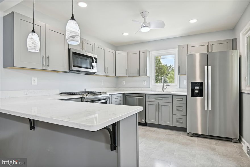 BACK ON MARKET - BUYER FINANCING FELL THROUGH   APPRAISED AT $390k  *(**   SELLER WILL ASSIST WITH CLOSING HELP BASED ON OFFERED PRICE***

 Beautiful MAJOR  RENOVATION inside and out with HIGH-END FINISHES!  This home was stripped to the "bones"  and BEAUTIFULLY RENOVATED reflecting the pride of the Owner!  Situated on a large corner lot with 2  Parking Pads in front and also includes an oversized garage with possible parking for 2 cars. beautiful Paved sidewalks and patio features a screened gazebo with electricity! Single-floor living incl. 1st fl. laundry & Primary  Bedroom with En-suite bath.  Open Floor plan Lower Level has a separate entry with high ceilings, and FULL BATH too! Easy to finish off for a growing family, in-law suite, or apartment rental.  This "ALMOST NEW" home will not disappoint!!! MOVE IN READY FOR YOUR ENJOYMENT