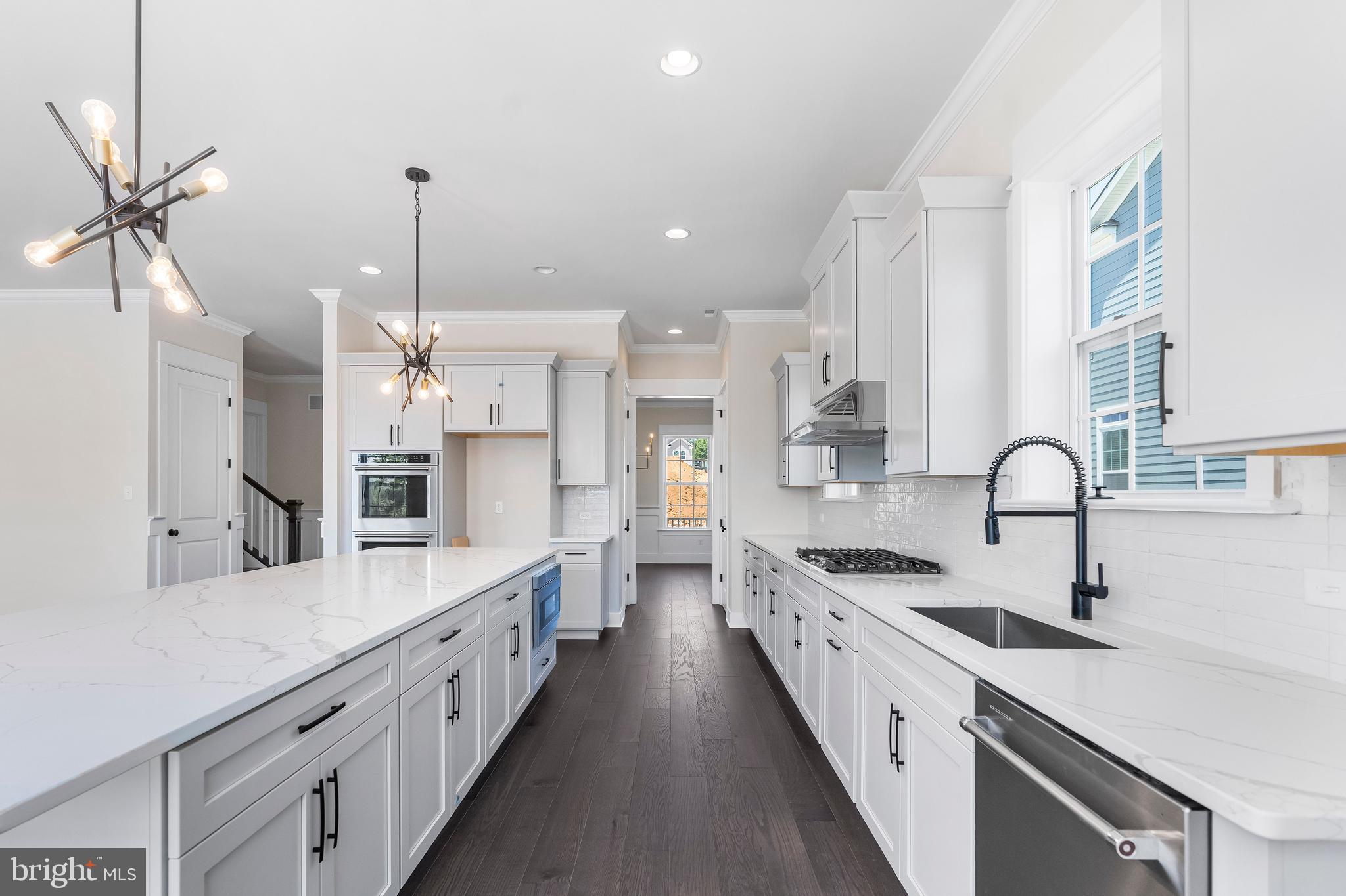 Final Ashley Floor Plan Available for Fall Move-In! ONLY 2 single family homes left within Spring Oak at Malvern!
This one-of-a-kind Ashley, the last remaining in the community, features upgrades throughout and an in-ground finished basement. The formal dining room connects to the chef's kitchen via a butler's pantry. Flanking the foyer is a versatile living room perfect for a home office.
The chef's kitchen boasts a large island with ample seating and stainless steel appliances, including a built-in microwave, wall oven, and cooktop with hood. The great room features a fireplace and plenty of windows.
Upstairs, the luxurious primary suite offers a soaking tub, walk-in shower, dual vanities, and a large walk-in closet. Three additional bedrooms include a Jack and Jill bathroom for bedrooms 3 and 4, and a private bath for bedroom 2, the princess suite. The second floor also includes a laundry room.
The finished basement has an increased ceiling height and plumbing in place for a future full bathroom, adding to this home's unique one-of-a-kind appeal.
Visit 136 Spring Oak Drive or schedule your tour today to explore this stunning home in the final phase of Spring Oak at Malvern. Photos are representative of a previously built home.