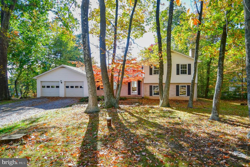 Charming split-level home with five bedrooms and three full baths  situated on a spacious one-acre lot in a highly desirable location. This well-maintained property offers a comfortable and functional layout with bright living spaces and plenty of room to grow. The inviting sunroom provides the perfect spot to relax and enjoy views of the beautiful yard year-round. Additional features include a two-car garage, generous storage space, and a private backyard ideal for outdoor entertaining or gardening. Conveniently located close to shopping, schools, and major commuter routes, this home combines peaceful country living with everyday convenience.