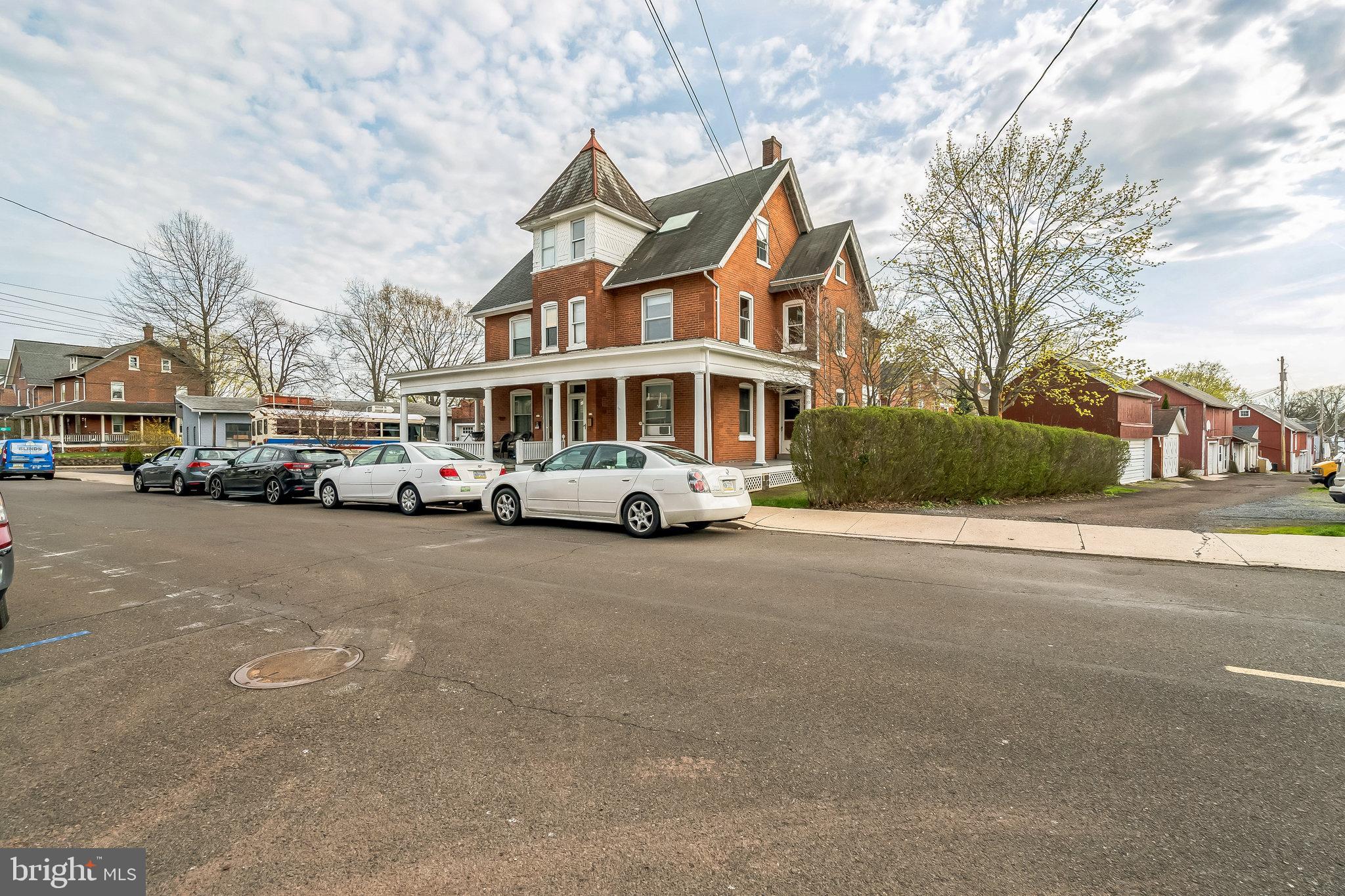 **Highest and Best Offers due by Saturday, 4/19 @ 5PM** Welcome to the charming Brick and Brush House, a distinctive brick twin located in the heart of downtown Perkasie. Showcasing over 2,200 square feet of living space, this thoughtfully designed home offers endless potential, whether you're looking for a spacious single-family residence or an income-producing duplex. Inside, you'll find original wood floors, soaring ceilings, and large windows that flood the home with natural light. Currently set up as a duplex, the layout includes a 1 bedroom, 1 bath first floor unit and a 3-4 bedroom, 1 bath second and third floor unit. The first and second floors feature generously sized living areas, full kitchens, and private baths—ideal for multi-generational living, rental income, or easily transitioning back to a single-family setup. One of the home’s standout features is the third-floor retreat. With its beautiful natural light and open layout, it's the perfect space for a home office, gym, or inspiring art space—truly a creative’s dream. Step outside and you're just moments from Perkasie's vibrant town center, where you can enjoy coffee shops, restaurants, boutiques, the local farmer’s market, and community events year-round. The home also offers convenient access to nearby parks and walking trails. Whether you're drawn to the character of a vintage home, the versatility of a duplex, or the vibrant lifestyle of downtown Perkasie, the Brick and Brush House delivers on every level. Don’t miss the opportunity to own this unique and spacious property in one of Bucks County’s most walkable and welcoming towns. Also listed as Residential - PABU2092422