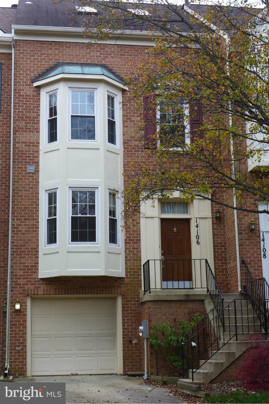 Upgraded Garage TH back to trees. 3 BRs, 2 BAs, 2HBAs. HW main lvl. Ceramic in kitchen. Spacious living rm w/high ceiling/Gas FP/Palladium window/glass door to balcony. Walk-out basement w/recreation rm/FP/Half BA/Laundry rm. Master suite w/Super Bath/separate shower/skylights/walk-in closet. Updated windows throughout for energy saving! Patio w/grill. Plenty parking. Close to school and I-270.