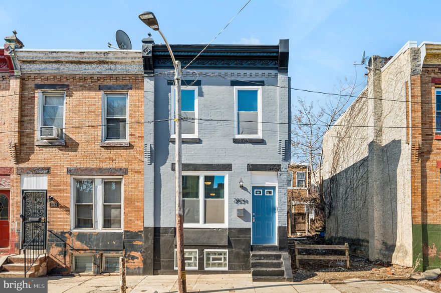 ***INVESTOR ALERT! BUY THIS PROPERTY AS AN INVESTMENT AND THE SELLER WILL PAY FOR LEASING SERVICES FOR YOU!*** OWNER-OCCUPANT ALERT! THE HOUSE IS ELIGIBLE FOR A $10,000 GRANT; YOU MIGHT QUALIFY FOR UP TO $25,000! ***  Stylish, Affordable, and Fully Renovated—Welcome Home to 2534 N Stanley St! This beautifully updated home offers high-quality finishes, modern convenience, and unbeatable affordability. With super low taxes, the Homestead Exemption, and eligibility for a $10,000 grant—or up to $25,000 in grants through select lenders—this is an incredible opportunity! Ask the listing agent for details. Step inside to discover a warm and inviting space featuring exposed brick, soothing gray walls, and rich brown vinyl plank flooring throughout—a perfect blend of style and durability. Ceiling fans in every room ensure comfort year-round. The updated kitchen boasts sleek granite countertops and stainless steel appliances, including a stove, microwave, and refrigerator. Enjoy a freshly poured concrete patio, perfect for relaxing or entertaining. Upstairs, you'll find two spacious bedrooms with vinyl plank flooring and an oversized, spa-like bathroom that feels like a personal retreat. Need extra space? The finished basement with a half bath is ideal for a home office, guest room, hobby space, playroom, or study area. Need some green? Fairmount Park is just a 10-minute walk, perfect for outdoor enthusiasts. Work in Center City? Your commute is just a 15-minute drive or a 30-minute bus ride if you prefer to read during your commute. Easy access to local restaurants, grocery stores, shopping, public transit, and major highways. A perfect combination of urban convenience and neighborhood charm. Schedule your visit to 2534 N Stanley today and explore all this home and the neighborhood have to offer!