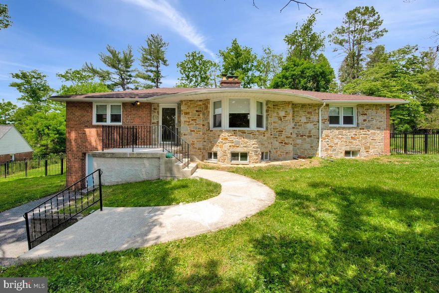 Welcome to this charming ranch-style home in the heart of Ellicott City offering spacious living across two finished levels. The main level showcases beautiful crown molding and recessed lighting throughout, creating a warm and inviting atmosphere. The bright living room features a cozy wood-burning fireplace, while the separate dining room provides the perfect setting for gatherings and entertaining. The updated kitchen is equipped with stainless steel appliances, quartz countertops, and a stylish tiled backsplash. The primary bedroom, two additional bedrooms, and a full bathroom complete the main level.

The finished lower level expands the living space with a large family room highlighted by a second wood-burning fireplace, two additional bedrooms, and a full bathroom—ideal for guests, a home office, or multi-generational living. Conveniently located near shopping, dining, parks, and major commuter routes, this home offers comfort, functionality, and an excellent location.