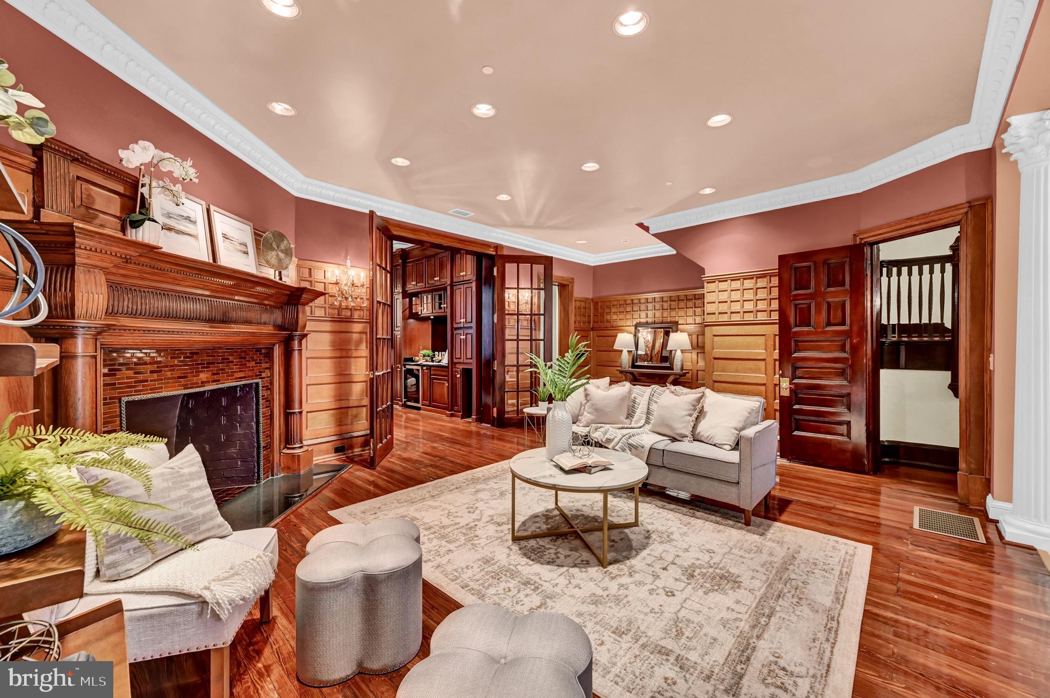 Exceptional opportunity to own a one-of-a-kind, historic 4.5-level brownstone in the heart of Mt. Vernon, spanning over 12,000 square feet. This 8-bedroom, 7.5-bath property is zoned for commercial use but is currently utilized as a luxurious residence. Meticulously maintained and immaculate throughout, this home features wrought iron accents on all windows and doors, with marble, ceramic tile, and hardwood flooring gracing every level.
Elevate your living experience with a full-size elevator, a 3-car garage, and gated off-street parking for 2 additional cars, complete with a brand new opener. Elegant crown molding adorns the entire home, while the gourmet kitchen is outfitted with top-of-the-line Viking appliances. Step outside to your private courtyard for a peaceful morning coffee.
This residence is equipped with modern conveniences, including a Kohler whole-house generator, central vacuum system, 400-amp electrical service, and five heating zones. The second floor boasts a theater room and multiple sitting areas. The fully finished basement is perfect for entertaining, with a bar, family room, full bathroom, two storage areas, an elevator mechanical room, and industrial sinks in the laundry area, along with extra refrigerators.
Blending historic charm with modern amenities, this home offers the best of both worlds. Don’t miss out—seller is open to owner financing with acceptable terms!