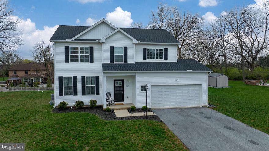 Better Than New! Built in 2022, this stunning home offers a bright, open layout in a peaceful cul-de-sac setting, complete with stylish modern finishes throughout. You’ll love the luxury vinyl plank flooring on the main level, which flows seamlessly through the open-concept kitchen, dining, and family rooms—perfect for entertaining. The kitchen features granite countertops, crisp white cabinetry, and stainless steel appliances. Just off the foyer, a versatile formal room can serve as a sitting area, home office, or dining room—whatever suits your lifestyle. Upstairs, the spacious primary suite includes a walk-in closet and private en-suite bath. Three additional generously sized bedrooms, a full guest bath, and a convenient laundry area complete the upper level. The lower level includes an egress window and insulation, making it easy to finish into extra living space. Outside, enjoy a beautifully landscaped yard, a covered front porch, and a rear deck ideal for relaxing or hosting gatherings. Conveniently located near I-83 and Route 30, and just minutes from shopping, dining, and local amenities.