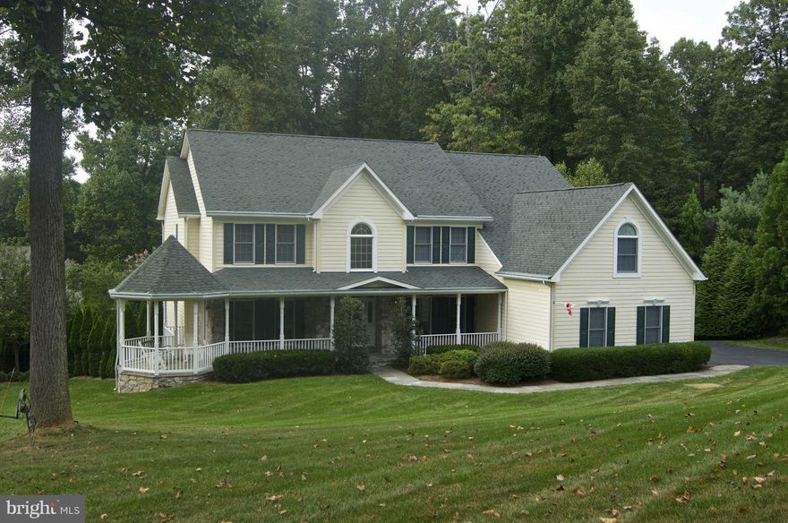 NEW PRICE! Beautifully situated 5 BR, 4 1/2 BA colonial on a bucolic cul-de-sac. Professionally landscaped grounds w/private rear yard, in-ground pool, & 3 car garage. Spacious open floor plan incl kitchen w/cherry cabinets, stainless appliances and family room w/lovely FP. Large Master w/luxury Bath, over-sized walk-in & Sitting Rm/Office. Finished L/L w/2nd FP & guest rm. plus walk-out to pool.