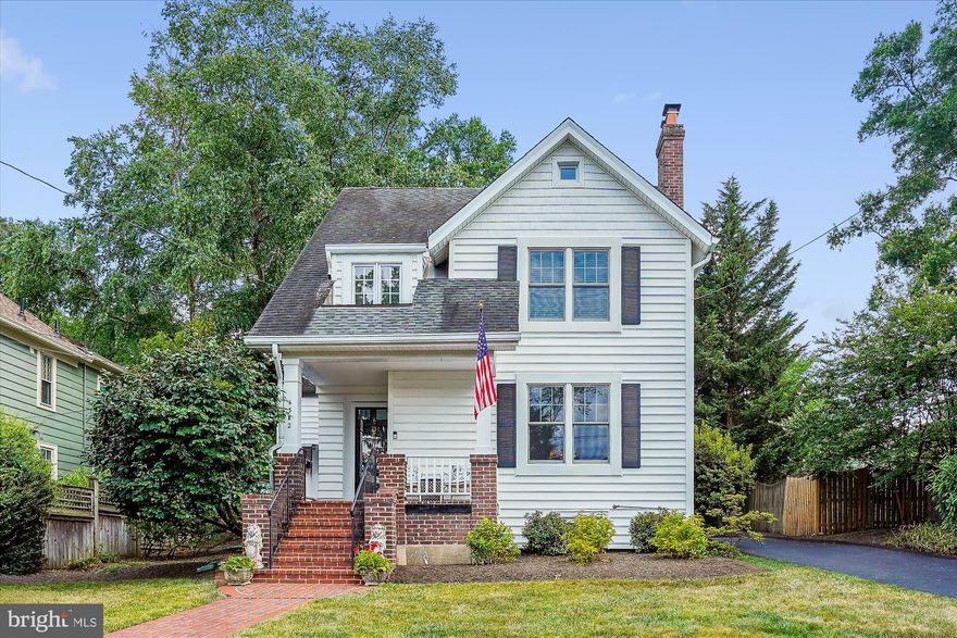 Experience the allure of this charming, expanded Colonial nestled in the coveted, family-friendly Waverly Hills neighborhood - mere steps from Ballston Metro, Ballston Quarter and the quaint Lee Heights Shopping Center. This 4-bedroom, 2 full / 2 half bath home boasts features including two staircases, two wood-burning fireplaces, recently installed Anderson windows and doors, refreshed front room hardwood floors, detached garage and full length private driveway.

With a welcoming front porch overlooking the peaceful street, step into this home's foyer that flows into the open, sunlit living room where you're greeted by the first of two cozy wood-burning fireplaces. Down the hall, the galley kitchen opens to a spacious, naturally lit eat-in area with a refurbished butcher block wraparound counter, built-in wine rack, and family room, complete with the second larger, stone-masoned wood-burning fireplace. In between the family and living rooms, enjoy a dining area that is perfect for both formal and informal gatherings, and even the occasional family holiday feast.

The main level also offers a large pantry, convenient mudroom with direct outdoor access, an additional refrigerator and an inviting powder room half bath. Outside the main double doors by Anderson, a slate patio awaits for outdoor entertaining opportunities, nestled between the flat backyard and detached garage bookending the expanded driveway. There is also a natural gas line from the house that can seamlessly connect to your gas grill (no need for propane tanks!).

Upstairs, the expanded primary bedroom includes an ensuite bathroom with a jacuzzi tub and separate, large standing shower. The fully carpeted suite also includes a large walk-in closet and plenty of natural light. Two additional naturally-lit bedrooms with hardwood floors, plenty of closet space, a recently renovated full bath, and a study/den/flex space complete the third level. The expanded fourth level provides versatility as a bedroom, office, playroom or gym along with ample walk-in storage space.

The basement level features a half bath, additional living space for activities, a separate room for washer/dryer, and plenty of extra storage.

This stellar property boasts easy access to major highways and is conveniently located minutes from airports, public transportation, the Pentagon, downtown Washington DC, Tyson's Corner, Virginia Hospital Center, Marymount University, and George Mason Law School. Enjoy easy access to restaurants, coffee shops, parks, playgrounds, and scenic walking and biking trails.

School pyramid includes Glebe Elementary, Hamm Middle School, and Washington Liberty High School. There are also several private schools within minutes of the property, one even within walking distance.

Don’t miss your chance to own this exceptional home in a prime Arlington location. Schedule your tour today!