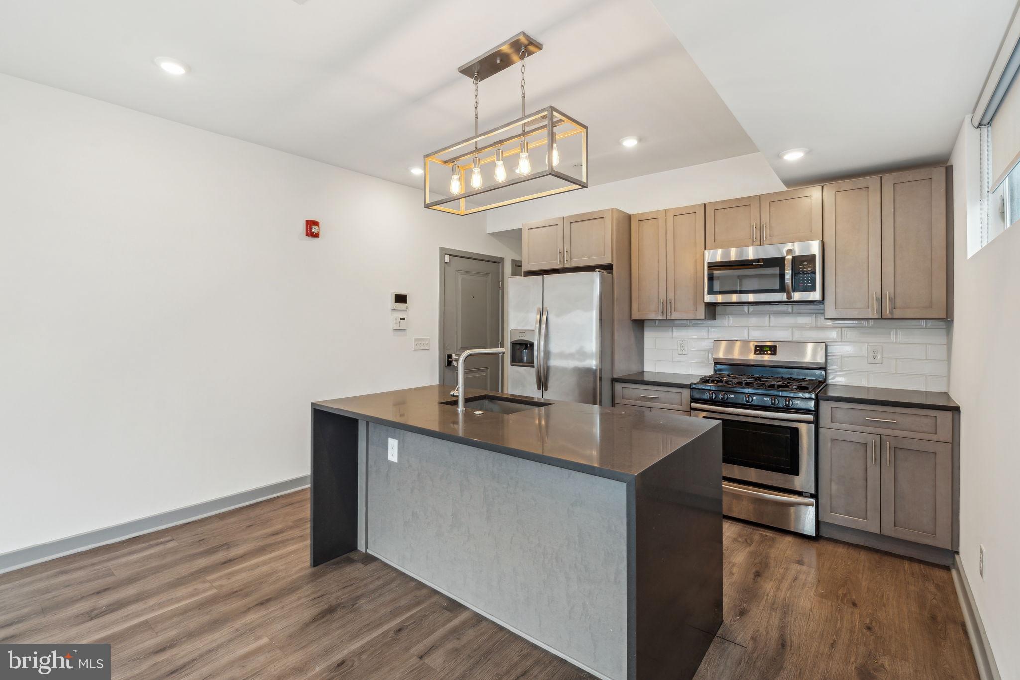 Welcome to 411 W Berks Street - a beautifully finished apartment in the heart of Olde Kensington—just minutes from the vibrant neighborhoods of Fishtown and Northern Liberties. Enjoy easy access to some of the city’s best dining, shopping, and entertainment. Unit 1 is a stunning 3-bedroom, 3-bathroom apartment featuring premium finishes throughout. The modern kitchen boasts upgraded appliances, while the oversized living area provides the perfect space for relaxing or entertaining. Each bedroom offers generous space and deep closets, and you'll find a sleek, modern bathroom on every floor for added convenience. There is a $75/month water fee. Generally, first month and two months security deposit due at, or prior to, lease signing. Other terms may be required by Landlord. $40 application fee per applicant. Pets are conditional on owner's approval and may require an additional fee and/or monthly pet rent, if accepted. (Generally, $500/dog and $250/cat, and/or monthly pet rent). Tenants responsible for: electricity, gas, cable/internet, and water. Landlord Requirements: Applicants to make 3x the monthly rent in verifiable net income, credit history to be considered (i.e. no active collections), no evictions within the past 4 years, and must have a verifiable rental history with on-time rental payments. Exceptions to this criteria may exist under the law and will be considered.