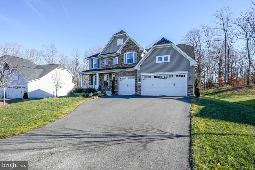 Nestled on 0.85 acres, this stunning home offers over $30K in recent upgrades, including custom walk-in closets, a new backyard patio, professional front yard landscaping, and elegant bedroom molding. The main level boasts hardwood floors, a gourmet kitchen with granite countertops, stainless steel appliances, a double oven, a large island, and a cozy family room with a gas fireplace. It is also complete with a formal dining room and an in-law suite with a full bathroom. The luxurious owner’s retreat upstairs features two custom his and her walk-in closets and a spa-like bathroom with a soaking tub, shower, and dual vanities. Three additional bedrooms include one en-suite, a Jack-and-Jill bathroom, and a convenient laundry room with extra cabinetry. The walk-up lower level offers a spacious rec room with epoxy floors, a full bathroom, a bonus room, and ample storage space. Step outside to enjoy the Trex deck overlooking a private, tree-lined backyard. Additional highlights include a backup generator, irrigation system, gutter guards, and a three-car garage. This home truly has it all!