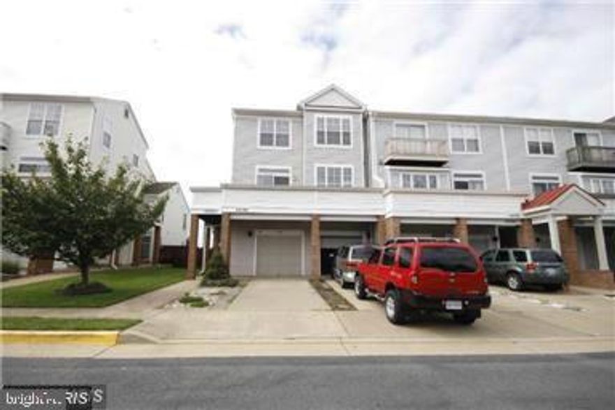 Condo Townhouse with 1 car garage, 3 bedrooms with 2.5 bath, Fireplace on the main level, Huge balcony, Pergo floor on all levels. .....A must-see. ....Access to use Ashburn Village Sports Pavilion.