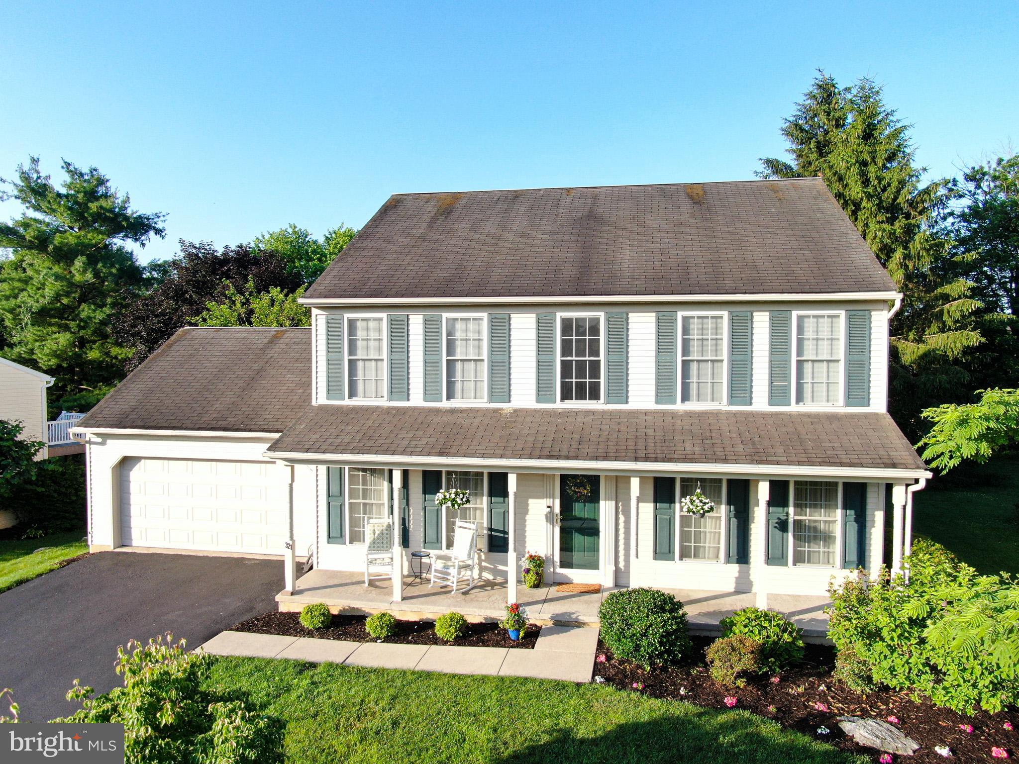 Beautiful colonial home just one mile from Historic Downtown Lititz! A two-story foyer with gleaming hardwood floors sets the tone for over 3,000 square feet of comfortable living. The well-appointed kitchen features a pantry, island, and dining area that opens seamlessly to the spacious family room with a cozy gas fireplace. A formal dining room, living room, powder room, and convenient laundry area complete the main level. Upstairs, the primary suite offers both his and her closets and a private bath with double vanity and tub/shower, three additional bedrooms, and a hall bath. The improved basement provides versatile extra living space plus a generous storage area. Enjoy the outdoors from the 14x18 deck overlooking the beautiful backyard. An attached two-car garage with extra storage completes the picture of this wonderful home. Included is a 10x14 shed, dryer, and mounted tv along with a 1 year home warranty for buyer peace of mind.