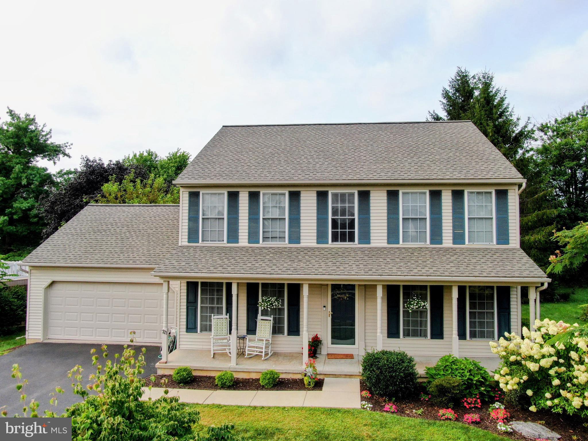 New Roof! The roof was completely replaced in August 2025. This beautiful colonial home is just one mile from Historic Downtown Lititz! A two-story foyer with gleaming hardwood floors sets the tone for over 3,000 square feet of comfortable living. The well-appointed kitchen features a pantry, island, and dining area that opens seamlessly to the spacious family room with a cozy gas fireplace. A formal dining room, living room, powder room, and convenient laundry area complete the main level. Upstairs, the primary suite offers both his and her closets and a private bath with double vanity and tub/shower, three additional bedrooms, and a hall bath. The improved basement provides versatile extra living space plus a generous storage area. Enjoy the outdoors from the 14x18 deck overlooking the beautiful backyard. An attached two-car garage with extra storage completes the picture of this wonderful home. Included is a 10x14 shed, dryer, and mounted tv along with a 1 year home warranty for buyer peace of mind.