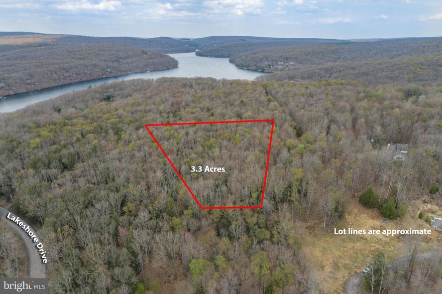 Rare Opportunity to own Acreage on Lake Shore Dr! This 3.3 acre parcel rests just off the sought after Lake Shore Drive and is centrally located minutes from State Parks, Wisp Resort, Local Marina's & Restaurants and Deep Creek Lake. Public Sewer connection is available! This private wooded homesite is just perfect for your mountain lake dream home... Call today for details!