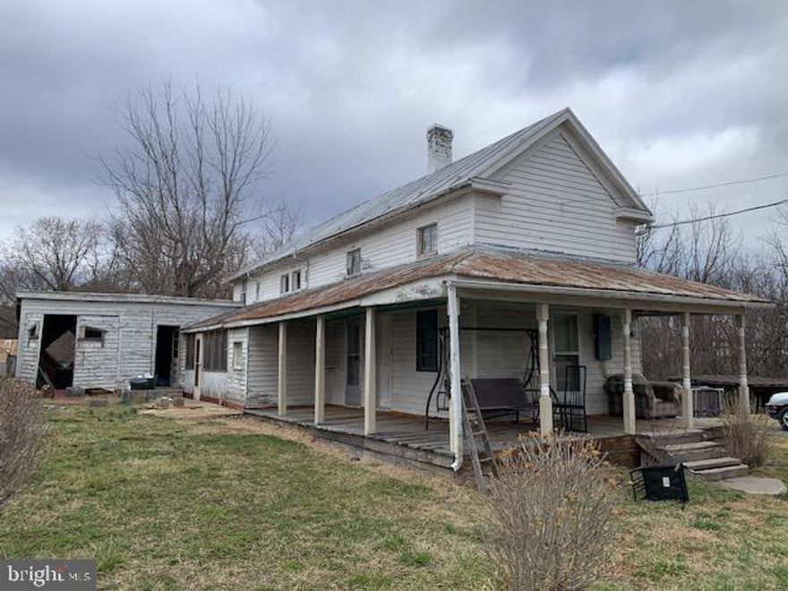 Attention investors! Great location in downtown Mount Jackson! Large 6 room 1412 sq/ft 3 bedroom 1 bath home on almost a 1/2 acre lot with adjoining 1/4 acre lot included in the sales price for a total of 0.65 acre. The home needs major rehab and will only go cash. Several outbuilding are on the lots that could be saved. Fix and flip the main house and build another home on the adjoining lot. Mount Jackson tap fee for water and sewer is 15K. Lots are located at the end of the street and back to a large wooded tract of land. The power is on, but the water & sewer are turned off. Both lots front on what could be the future Rails to Trails project. The main home was tenant occupied as recently as Feb 2025 and rented since 2021 for 400 per month. Close to town park and shopping! Seller will not provide or pay for any inspections. This property is being sold in "As-Is" "Where-Is" condition.