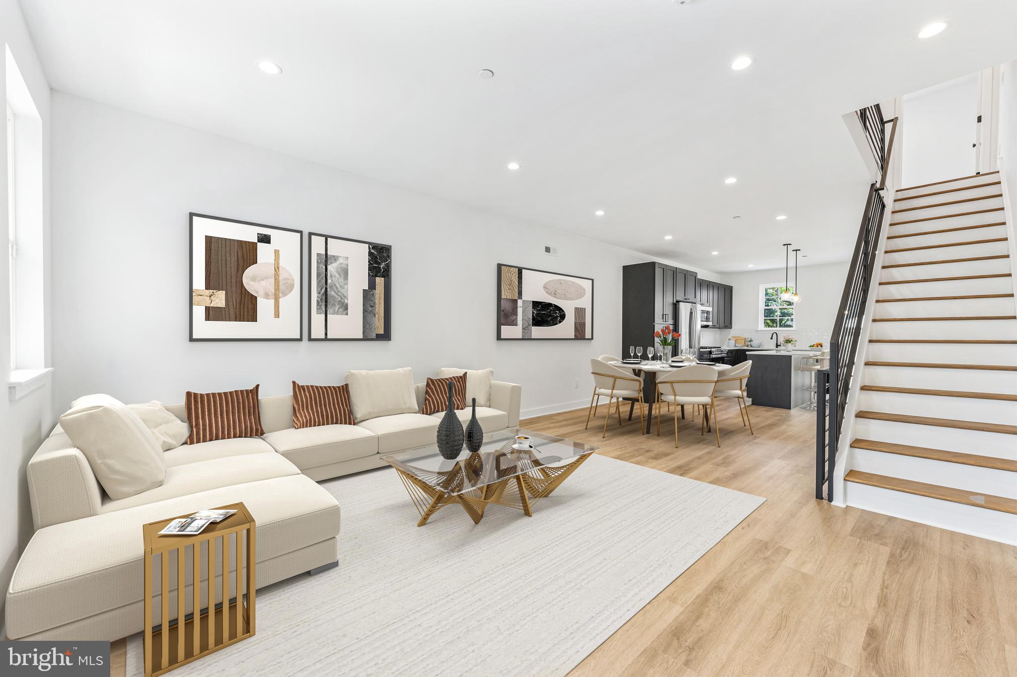 Welcome to 1608 N. Newkirk St., a stunning 2,300 sq. ft., 5-bedroom, 3-bathroom custom-built home in Brewerytown. This new construction offers unparalleled craftsmanship and luxurious living, with easy access to I-76 and the Art Museum. Step inside and enjoy an open-concept living area with a gorgeous kitchen featuring custom cabinetry, a spacious island, and stainless steel GE appliances. The large, private, fenced-in backyard is perfect for entertaining.
The second floor includes two spacious bedrooms, a laundry room, and a luxurious bathroom equipped with a tub/shower and a double vanity. Head up to the third floor and be greeted by a versatile space—ideal for an office, nursery, or sitting area. Down the hallway is a spa-like bathroom with a double vanity and a glass-enclosed shower. The primary bedroom is large enough to comfortably fit a king-size bed.
The basement features a full bathroom with a shower, an entertainment area, and a fifth bedroom. Each bedroom includes closets with shelving and ample storage. This property comes with an approved 10-year tax abatement and a one-year builder's warranty. Don’t miss this unique opportunity! Ask a about the loan program with our preferred lender