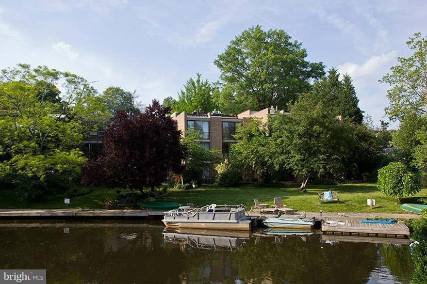 Lakeside townhouse community in Reston with great views of the lake, restaurants and lovely plaza. The lake is on the backside of the house, with tall windows for a relaxing view. The house has 3  spacious bedrooms, 5 levels, gleaming hardwood floors, newer appliances . The back of the house faces Lake Anne, and the front of the house faces the parking area.