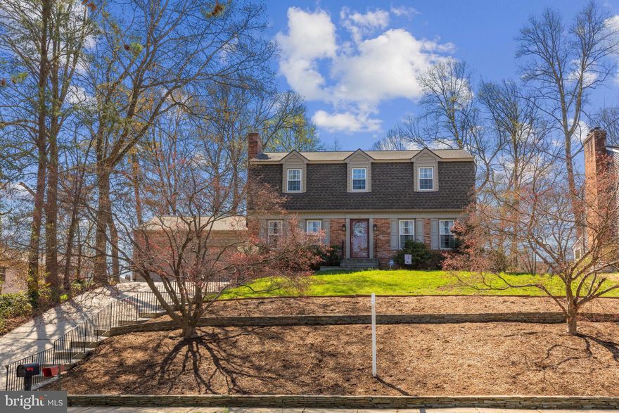 Located in sought after Admiral Heights. This pristine 4 bedroom, two full and one half bath with two car garage has been meticulously maintained and updated . Recent improvements include a gorgeous kitchen with upgraded cabinets and moldings, granite counters, subway tile backsplash and Kitchen Aide stainless appliances . The oversized pantry offers lot's of storage . Enjoy the Lush Landscaping  and Designer Flagstone Patio & Hardscape from the Breakfast Nook Bay Window . Wood floors throughout  the Main  
LEVEL .The inviting Family Room with Brick Fireplace adjoins the kitchen. The Spacious Living Room  and Formal Dining Room are perfect for entertaining. New carpeting was installed on the upper level on 3/29. The Owners Suite includes an Oversized Bedroom with both a Walk-in Closet as well as an ample additional closet and  Renovated Bath with Updated Vanity & Shower Stall . The additional Bedrooms offer Ample Closets for Storage and two will accomodate Queen Sized Beds. The Main Bath has been Renovated with both Vanity & Tub. The Main level powderoom has been renovated.The Full Basement with Walk-Up is ready to be finished by the new owners. 
Recent improvements include: Roof '22, Windows '21, Chimney re-lined '23, Kitchen & Wood floors '21, Baths '19, gargage disposer 3/25, carpeting 3/29/25.