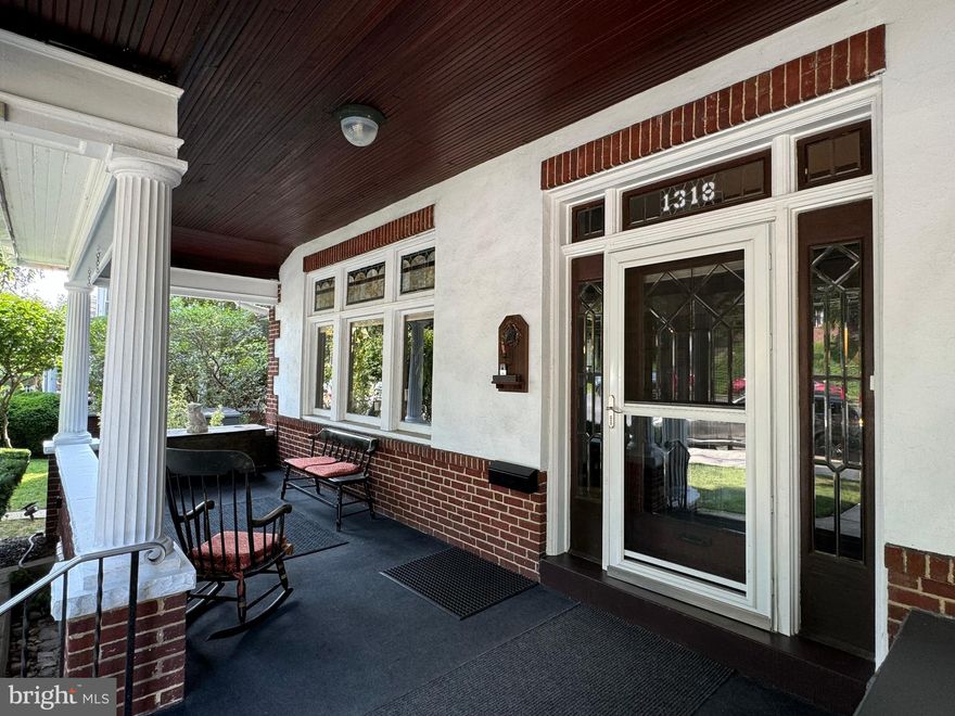 Come Tour the Gem of Hampden Heights and experience this unique and rare find which embraces traditional Old Reading Architecture with today's modern upgrades. 
This is an incredibly spacious Sundrenched home which showcases a beautiful large living room and fireplace, Dining area, 6 Bedrooms and 3.5 Baths. The main level boasts a beautiful eat-in kitchen, a wood burning fireplace, and original French doors. Upstairs, you'll find Large Bedrooms with the Master Bedroom with Full bathroom. Original bow windows in bedrooms, all conveniently connected to a hallway full bath. Throughout the home you can find original stained-glass windows, wood trims, and hardwood flooring. The basement expands your living options with three versatile areas, ideal for a living space, office space, or workout space. Connected to the basement is a 1 car garage which has been converted to a Movie Theater Room. Outside, enjoy a screened in balcony, a fully fenced yard for your privacy with a large driveway, and an upper and lower deck. Perfect for outdoor activities and entertaining. For additional storage, there is a storage room in the Basement as well as on the 3rd floor. This home also includes a brand-new roof with a warranty. This Historic home offers both space and style in a desirable location. Come View this Amazing home today !