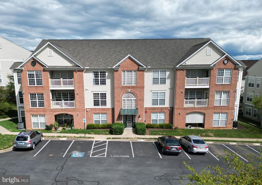 Amazing, updated 1370 square foot penthouse apartment featuring a modern, open floorplan in Ridgeview III, a secure elevator condominium complex in the Whittier community of Frederick. This awesome property features an updated gourmet kitchen with recessed lighting, quartz countertops and stainless-steel appliances, an adjacent flex room which could serve as a family room, home office, atrium, etc.  There’s a huge living room with cathedral ceiling, recessed lighting, ceiling fan, and neutral paint, plus a dining room with updated lighting.  The primary bedroom features a spacious walk-in closet, second closet, vaulted ceiling, ceiling fan, and an updated private bath. There’s also a large second bedroom and additional full bathroom. The furnace and air conditioner units were replaced in 2017.  The Whittier community is awesome, with pools, tennis courts, a wonderful lake, shops, walking paths, and much more. The neighborhood is just minutes from downtown Frederick, FCC, and Fort Detrick and accessible to all major commuting routes. The home is light and bright and move-in ready. This one won't last! Hurry!