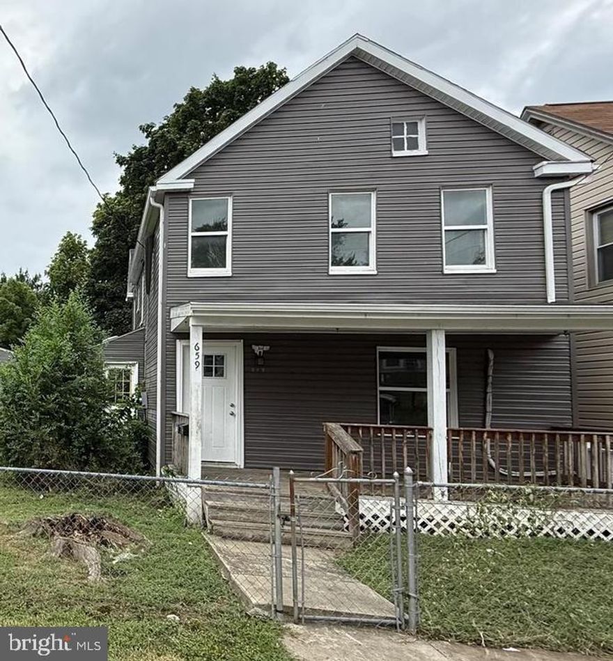 Calling All Investors...Make an Offer!  Property to be sold "as is" includes 659 Faulkner Avenue a detached 4 bedroom, 2 bath unit that is recently vacated by a long term tenant...in need of cleanup and rehab. 
This Colonial-style residence, built in 1900 presents an opportunity for those looking to capitalize on the growing Martinsburg market.