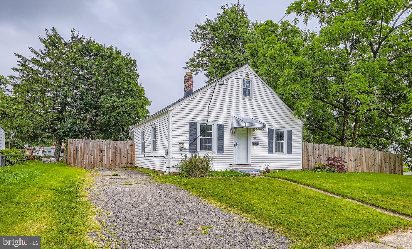 Charming Cape Cod on a Corner Lot—Priced Better Than a Townhome! Welcome to this delightful 3-bedroom Cape Cod offering an incredible opportunity for buyers! Tucked on a spacious corner lot, this home features a fully fenced-in backyard, garden beds already producing fresh veggies, a shed for extra storage, and a cozy firepit ready for summer nights. Step inside to find all new flooring on the main level, a refreshed kitchen with updated cabinets and appliances, and an updated full bath. Upstairs, you’ll love the charm of original hardwood floors in the primary bedroom. The home also offers some fresh paint, a 2-car driveway, and plenty of outdoor space to relax, entertain, or grow your dream garden. This home has character and smart updates where it counts—all at a price point that’s less than many townhomes! Why settle for shared walls when you can own a detached home with room to roam? Conveniently located close to commuter routes, shopping, and local amenities. Don’t miss this affordable chance to own your own home with land, privacy, and potential!