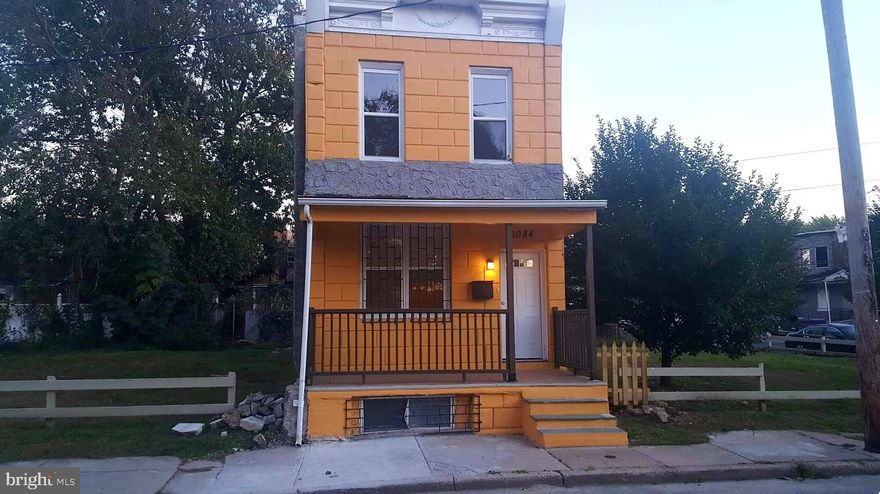 Here is your chance to purchase in the up and coming SouthWest Philly area! Beautifully updated two story and 3 bedroom row house with enclosed front porch. Enter into a large bright living room with recessed lighting. Wood flooring throughout the living and dining room lead to the kitchen. Good size backyard. Second floor offers three large bedrooms and one bathroom. Plenty of closet space. Full unfinished basement offers plenty of room for storage.  Affordable starter home for first time buyers or excellent value for investors. Rents is $850 a month. Currently tenant occupied. Seller is motivated - bring all reasonable offers.