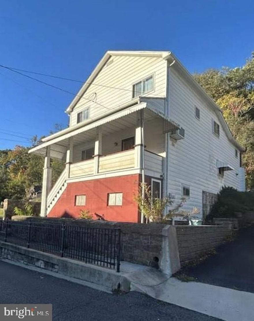 Large family home with 4 bedrooms, 2 full baths, eat-in kitchen, and a formal dining room...One bedroom and bath is on the main level as well as the laundry room with washer/dryer and sink....the kitchen has lots of counter space, cabinets and table space, includes stove and refrigerator...Upstairs are 3 bedrooms and an over-sized bath...there is also a storage room and a huge walk-in closet....the basement is clean and dry for lots of uses, with two walk-out doors....nice front porch, a paved driveway and in the back yard area there is a patio with lots of privacy backing to trees