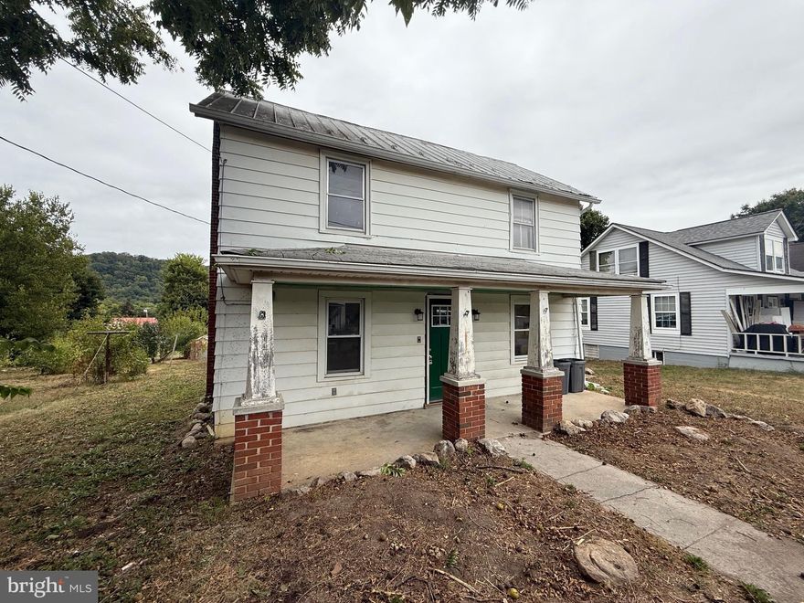 Home with a nice sized yard in Great Cacapon West Virginia.  Well and public sewer.  Lots of potential.  Wood heat and hardwood floors. You can finish how you like for sure.  A lot of renovations have been started. A must see!