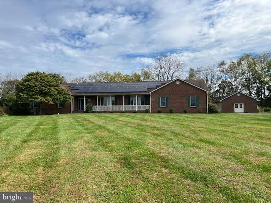 Nestled on 3 peaceful acres in Woodbine, this beautifully maintained CUSTOM builder brick home boasts 3 bedrooms and 2 ½ baths on the main level, 9' ceilings in the family room, kitchen, living and dining room, along with a large gourmet kitchen featuring a center island, 42”h natural maple wall cabinets and upgraded stainless steel appliances. The lower level is fully finished with an estimated 1,600 sq ft of living space--bringing the total finished area to approximately 4,000 square feet.  Large maintenance free deck, complete with a retractable awning is the perfect space for entertaining or just relaxing! An oversized 2-car garage and outbuilding with endless possibilities rounds out this exceptional home--this peaceful and private retreat is a rare find in Woodbine.