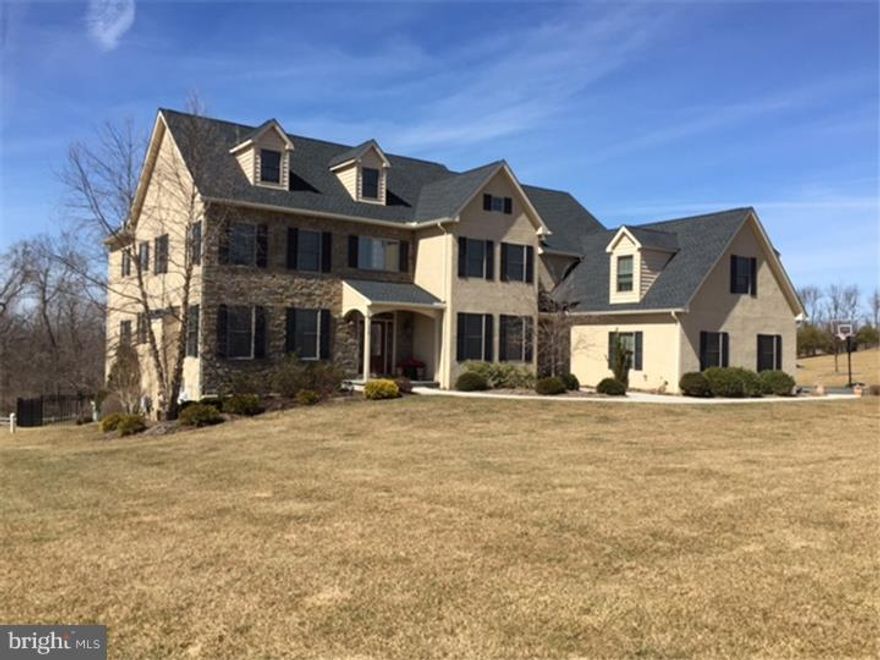Where to begin to describe this grand property is the biggest challenge. Situated on a 1.51 acre lot in the desirable Marcel Manor community this fantastic 6 bedroom, 6.2 bath custom home boasts 9000 plus sq. ft. of finished living space over three stories. Starting in the expansive kitchen that features cherry cabinets, granite, high-end stainless appliances, a large 4 seat island, butler's pantry and an impressive morning/breakfast room. The main floor offers a large living and formal dining room with all the expected upgrades, a private office and an inviting sunken family/gathering area. The 6 spacious bedrooms include a master retreat with dual closets, large bath and sitting area. Three of the remaining bedrooms are ensuite with one being a private guest quarters and two other share a full bath. The finished lower level is equally impressive with the large wrap around bar and expansive entertaining sections including the main seating area and the gaming room that leads to the outside living space. To complete the lower level there is a great home gym with a full bathroom. The exterior is no less impressive and built with entertaining in mind from the in-ground pool and professionally hardscaped patio and gathering area. The list of upgrades and custom details in this impressive home are vast and can not be appreciated until they are seen. Schedule a private showing today.