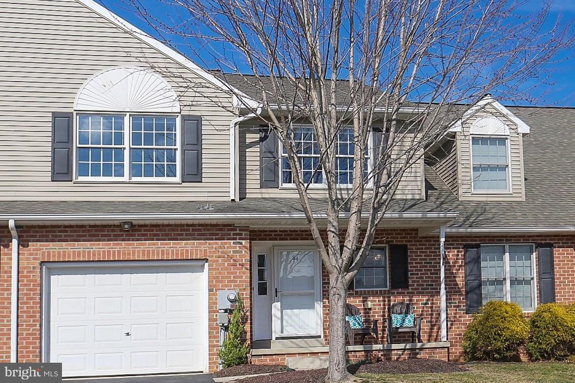 Move right in! Spacious open plan w/vaulted living room. Beautiful wood laminate floors throughout 1st floor, updated kitchen w/tile backsplash, new stainless dishwasher & refrigerator. Convenient 1st floor laundry w/sink. Totally updated bath w/double vanity & 3 spacious BRs upstairs. Nice deck & clean slate basement complete this lovely home.
