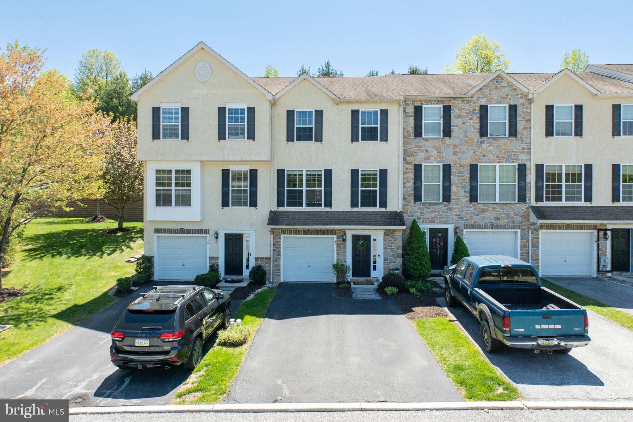 Back To Active due to an unfortunate circumstance with the buyers.
Welcome to 30 Lukens Mill, a beautifully refreshed townhome offering a perfect blend of modern updates, thoughtful design, and everyday comfort. Step inside to a spacious finished lower level featuring brand-new luxury vinyl plank flooring — creating a durable, stylish space ideal for a home office, gym, playroom, or extra lounge area. This level also includes a convenient half bath, offering flexibility for guests and day-to-day living with plenty of extra room for storage.
Upstairs, the main living level continues to impress with matching new luxury vinyl plank flooring throughout. The updated kitchen shines with crisp cabinetry, sleek Quartz countertops, and modern fixtures, setting the stage for both daily meals and effortless entertaining. Just off the kitchen, you'll find an expansive living room — larger than most homes in the neighborhood — offering plenty of room to gather and relax. A sliding door leads from the living area to the deck and backyard, making indoor-outdoor living a breeze.
The main floor also features a spacious dining area, filled with natural light, creating a bright and cheerful setting for meals and entertaining.
The upper level offers three generously sized bedrooms, including a primary suite complete with an updated private bathroom. An additional full bath upstairs has been stylishly updated, offering fresh, clean finishes. Newer carpeting on the staircase adds a soft, welcoming touch as you move between floors.
Thoughtful updates throughout, including the luxury vinyl plank flooring on both levels, refreshed bathrooms, and an updated kitchen make this home truly move-in ready. Plus, you'll enjoy a low-maintenance lifestyle close to shopping, dining, parks, and major highways, offering convenience without compromise.
Come experience all the space, updates, and comfort 30 Lukens Mill has to offer — schedule your showing today!