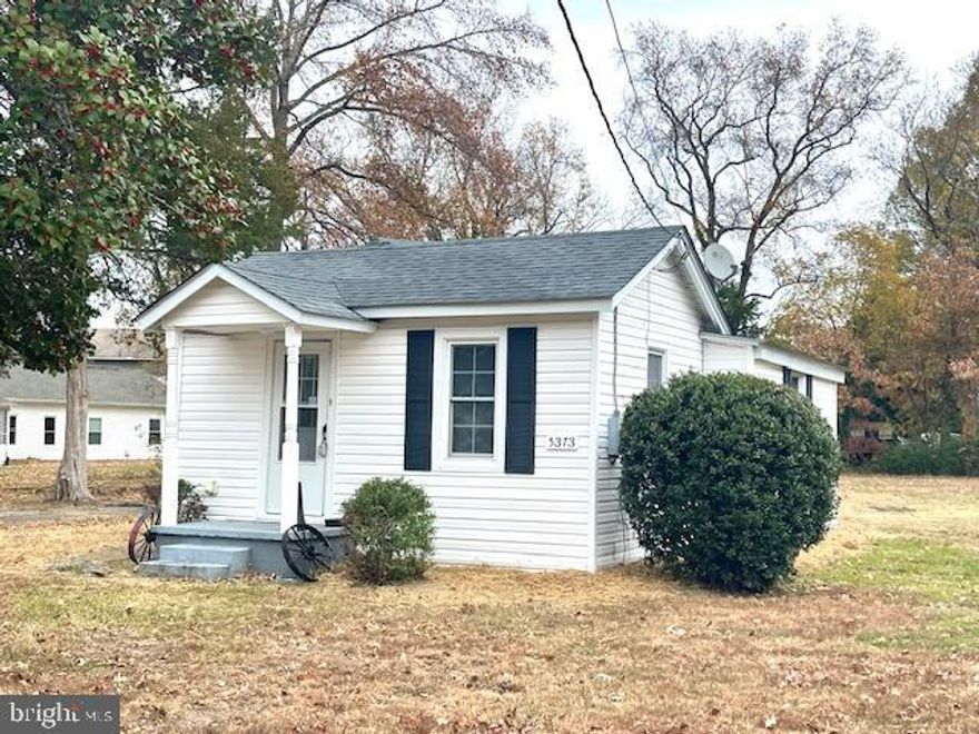 Charming little home that's been newly renovated and refreshed! New LPV flooring in the living room, bedroom and bath. The kitchen is surprisingly big and features plenty of cabinet and counterspace plus a washer and dryer.  A new deck is being added in the rear and there is a storage shed.
Water and Sewer are included in the rent (up to $200.00/month) as well as lawncare.