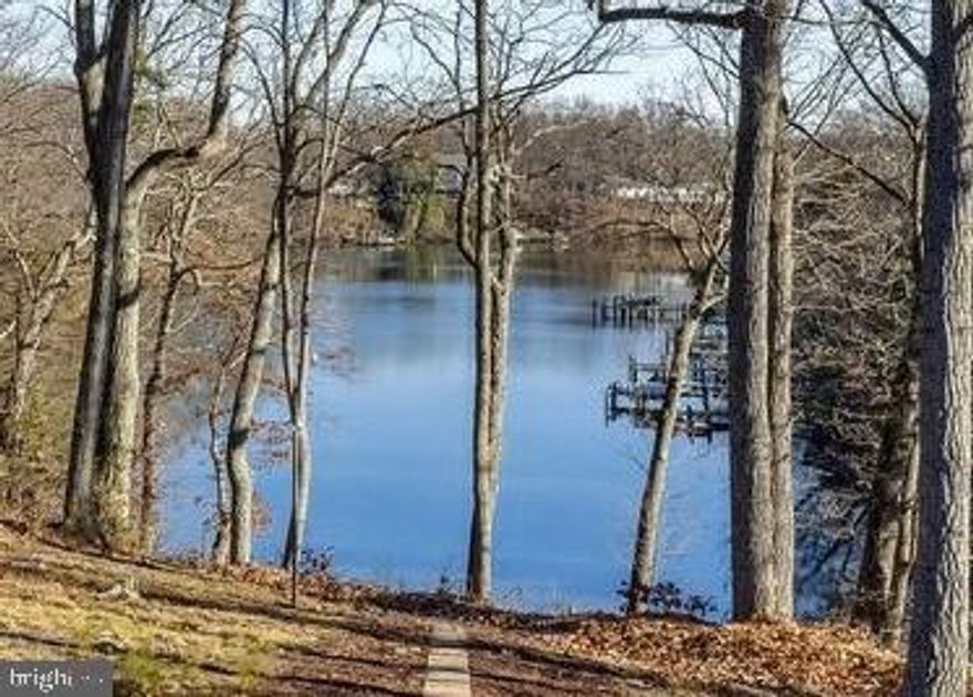 WATERFRONT OPPORTUNITY

Located in the legendary Admiral Heights : 300'' + of waterfront on Weems Creek off the Severn River (survey uploaded in disclosures) : existing pier:  close to the US Navel Academy :  close to the Navy Stadium The 2668 SF brick and cedar rancher is sited on 1.27 acre lot- one of the largest lots in Admiral Heights : attached two car garage : expansive 62' deck overlooking the beautiful water view : three bedrooms : 2.5 baths : living room with wood burning fireplace : sunroom off living room with entrance to the master bedroom suite : Voluntary HOA
The location is so close and convenient, so private and so quiet, it's simply awesome.