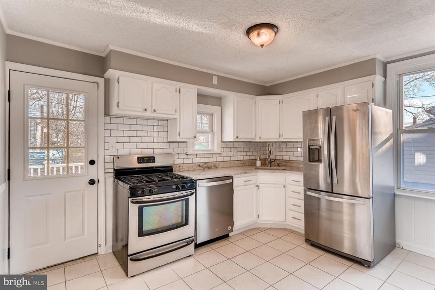 Beautifully renovated bungalow in sought after Hamilton/Gardenville. Own for less than renting, this move-in ready home with all the bells and whistles! Gracious living space includes spacious living room and dining room, New Kitchen with granite counter-tops, white cabinets, stainless steel appliances and pantry. Three first floor bedrooms with updated and upgraded full bathroom. Lower level features large open area with gas hookup for fireplace, rough-in for full bathroom, bar for entertaining and large laundry room. Step outside and enjoy the enormous deck overlooking the lush landscaping. This one will be gone quickly, see it today!