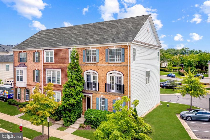 Incredible brick front, end unit garage townhome in the vibrant community of Lansdowne.  Just steps from the Town Center, this vibrant location is home to a plethora of shops, restaurants,  and entertainment options.  Truly the best value for quality and location!
<br><br>
As an end unit, this pristine and well maintained home feels private and quiet, and is flooded with natural light from three sides.  The floor plan is open and the entire home features brand new carpeting and paint throughout.  The gourmet kitchen features upgraded countertops and cabinetry as well as a convenient center island and pantry, desirable gas cooktop and double wall oven.  The layout is expansive including a living room, dining room, and breakfast room.   Enjoy morning coffee or evening meals on the main level balcony, accessible from the breakfast room and kitchen.
 <br><br>
Upstairs you'll find the primary suite with access to a second, private balcony,  two walk in closets and a luxury bathroom, as well as two additional spacious bedrooms with ample closet space and a second full bathroom.  The laundry room is conveniently located on the bedroom level.
 <br><br>
The lower level is accessible from the rear-loading two car garage or the front foyer.  It boasts a large open space suitable for a family room to enjoy movie nights or a home office that is separate from the main living areas offering a private and quiet place to work. Functionally, the home has a newer high-efficiency air conditioning system, newer washer & dryer, added garage storage, and refurbished balconies - in addition to the new carpet & paint - move right in without spending a penny!
<br><br>
Located adjacent to the pool and clubhouse, there is ample visitor parking,  in addition to your personal garage and driveway. Enjoy a short walk to a variety of retail establishments including several restaurants, coffee shops, dry cleaners, pet care, eye and dental care,  grocery stores,  pharmacy and banking!    Convenient access to the central square with a splash pad, common area and stage where concerts are hosted on the weekends.  Amenities include a community pool, clubhouse, fitness center, jog/walking trails, dog parks, playgrounds and more.   Just minutes to Lansdowne Resort as well as Leesburg Premium Outlets, Dulles Towne Center mall, and several major commuter routes (7, 28, 267) and Dulles Airport. This one has it all!