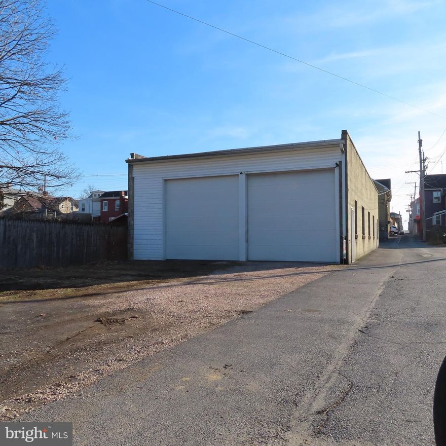 FOR STORAGE ONLY -  No restroom on this property.  Can not be used for business purposes.  Has a large garage over 2,272 Sq. Feet. and a small parking lot.  Great for storage.